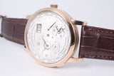 A. LANGE & SOHNE ROSE GOLD LANGE 1 TIME ZONE MINT 136.032 COMPLETE BOX & PAPERS $33,500