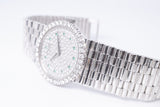 PIAGET LADIES WHITE GOLD DIAMOND AND EMERALD DIAL DRESS WATCH