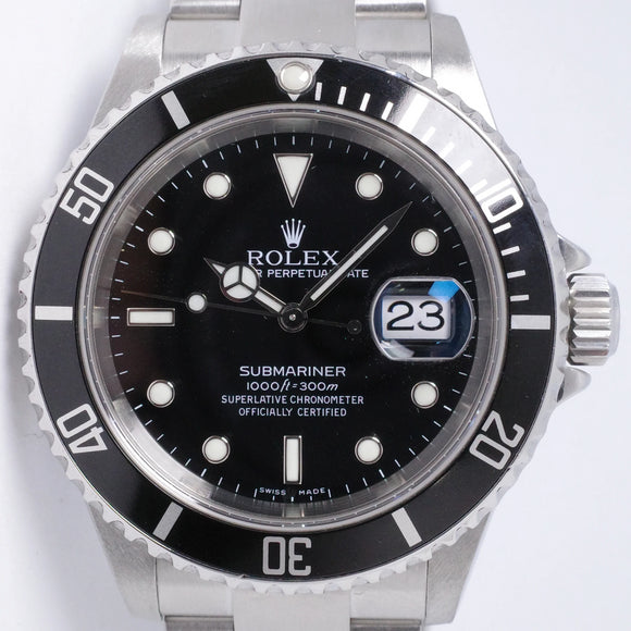 ROLEX STAINLESS STEEL SUBMARINER DATE 16610 w/ SERVICE PAPERS $8,250