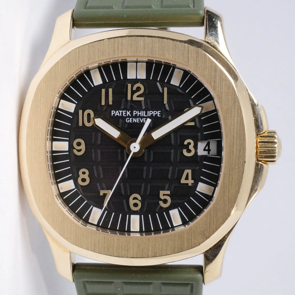 PATEK PHILIPPE YELLOW GOLD AQUANAUT 5066J WITH PAPERS AND 3 SETS OF STRAPS $44,000