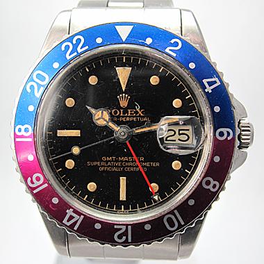 ROLEX VINTAGE GMT MASTER GILT DIAL, CHAPTER RING, PATINA, FUCHSIA INSERT REF. 1675