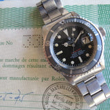 ROLEX RED SUBMARINER FADED INSERT, ORIGINAL BOX AND PAPERS 1680