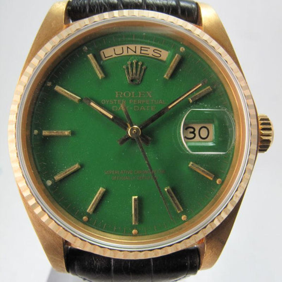 ROLEX 18K YELLOW GOLD DAY-DATE ON STRAP WITH GREEN STELLA DIAL 18038