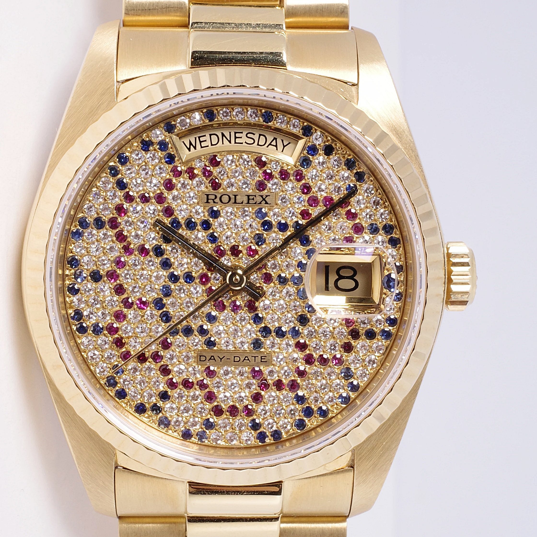 Rolex day date on sale gold diamond ruby