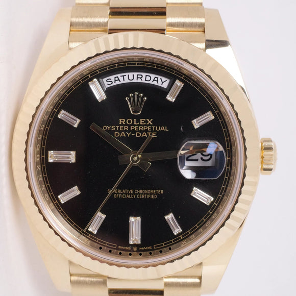 ROLEX NEW YELLOW GOLD DAY-DATE 40 BLACK BAGUETTE DIAMOND DIAL 228238