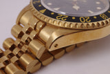 ROLEX NEW OLD STOCK YELLOW GOLD GMT BLACK DIAL JUBILEE BRACELET BOX & PAPERS 16718