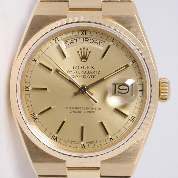 ROLEX YELLOW GOLD OYSTERQUARTZ DAY-DATE CHAMPAGNE DIAL 19018 MINT