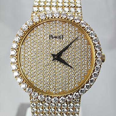 PIAGET 18K YELLOW GOLD AND DIAMOND DRESS WATCH Honolulu Time PIAGET 18K YELLOW GOLD AND DIAMOND DRESS WATCH Honolulu Time