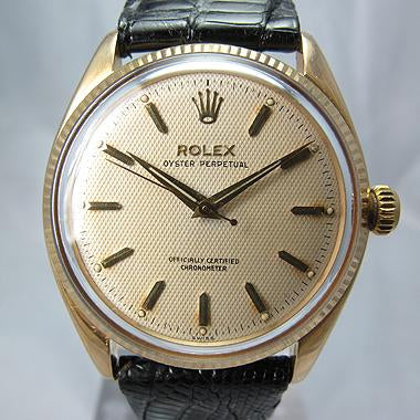 ROLEX 18K GOLD OYSTER PERPETUAL HONEYCOMB DIAL